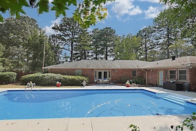 Secluded Brick Ranch Retreat on 20+ Acres with Private Lake & - photo 34