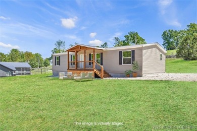 Lake of the Ozarks Home Active Under Contract in Gravois Mills Missouri