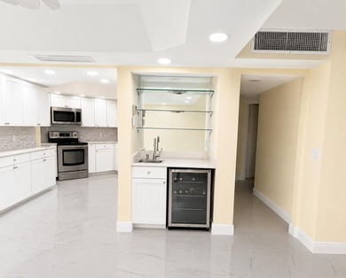 Welcome to the newly transformed Dune Deck Condominium, where - photo 27