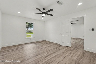 Completely updated 3-bedroom, 2-bath home with city water in the - photo 11