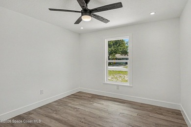 Completely updated 3-bedroom, 2-bath home with city water in the - photo 12