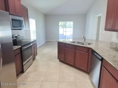 Welcome to this charming, 4-bedroom, 2-bathroom home nestled in - photo 2