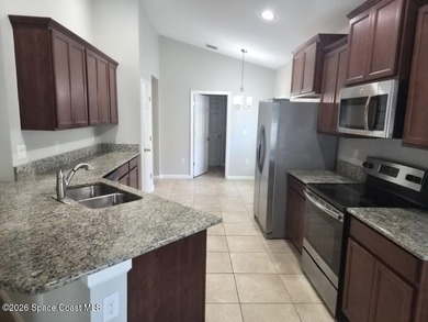 Welcome to this charming, 4-bedroom, 2-bathroom home nestled in - photo 3