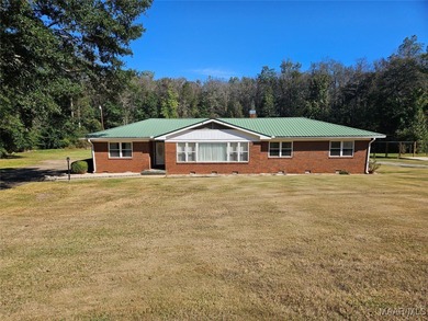 Check out this beautiful brick home on double lot! Three