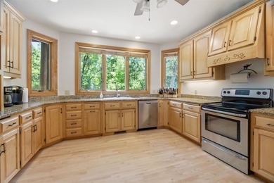 Custom built and thoughtfully designed, this stunning log home - photo 17