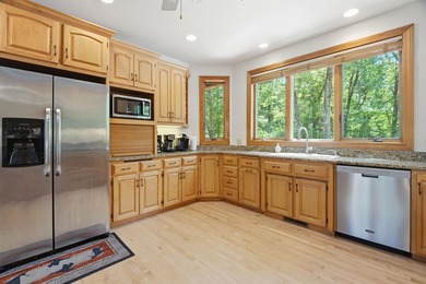 Custom built and thoughtfully designed, this stunning log home - photo 18