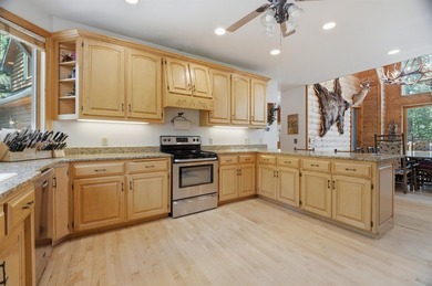 Custom built and thoughtfully designed, this stunning log home - photo 20
