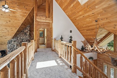 Custom built and thoughtfully designed, this stunning log home - photo 28