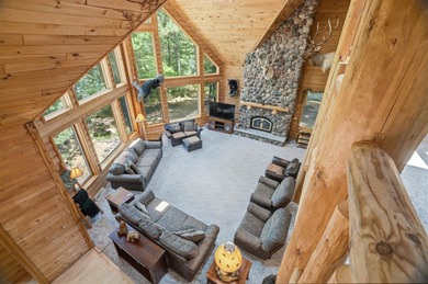 Custom built and thoughtfully designed, this stunning log home - photo 29