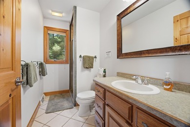 Custom built and thoughtfully designed, this stunning log home - photo 30