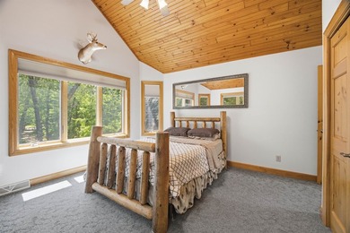 Custom built and thoughtfully designed, this stunning log home - photo 32