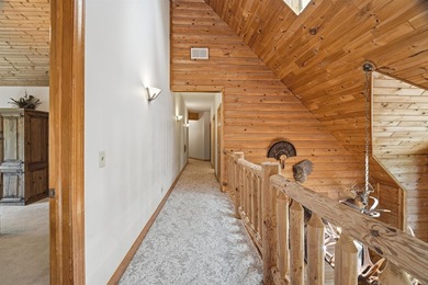 Custom built and thoughtfully designed, this stunning log home - photo 33