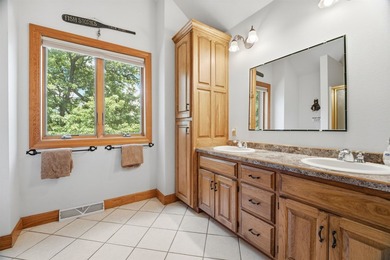 Custom built and thoughtfully designed, this stunning log home - photo 39