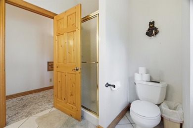 Custom built and thoughtfully designed, this stunning log home - photo 40