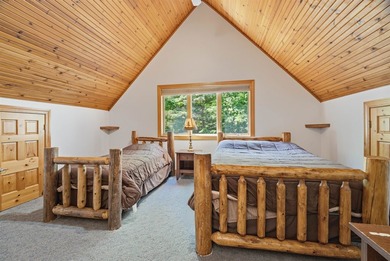 Custom built and thoughtfully designed, this stunning log home - photo 46