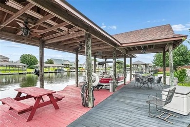 Welcome to this stunning English Tudor-style waterfront home in - photo 21