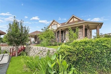Welcome to this stunning English Tudor-style waterfront home in - photo 22
