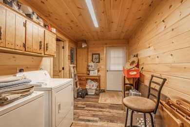 Escape to the lake with this charming 3-bedroom, 1.5-bath cabin - photo 29