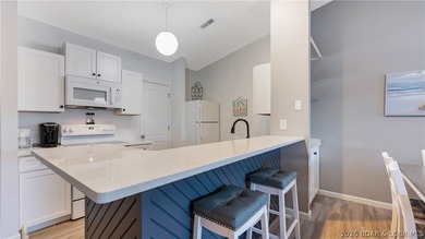 Affordable & Updated 2-Bed, 2-Bath Condo with 12x32 Boat Slip on - photo 4