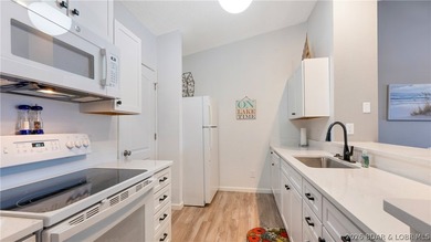 Affordable & Updated 2-Bed, 2-Bath Condo with 12x32 Boat Slip on - photo 6