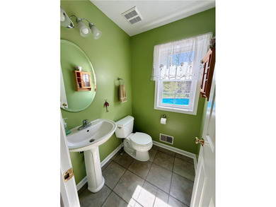 Spacious 4-bedroom, 2.5-bath home featuring a dramatic 2-story - photo 5