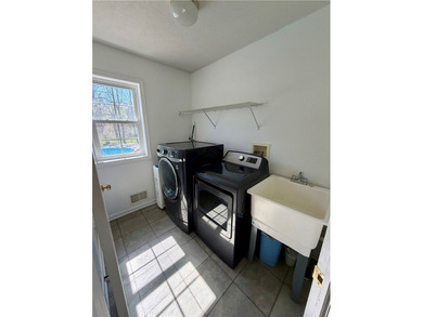 Spacious 4-bedroom, 2.5-bath home featuring a dramatic 2-story - photo 6