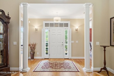 Welcome to 2118 Bay Colony Lane, an elegant 1.5-story brick - photo 2