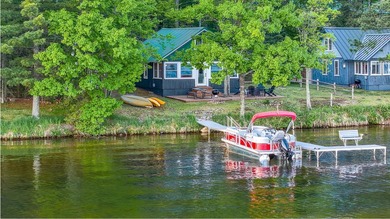 This one has a Northwoods personality with classic rustic charm - photo 12