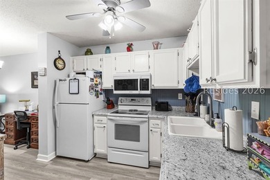 Experience the ultimate island lifestyle in this nicely updated - photo 12