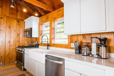 This one has a Northwoods personality with classic rustic charm - photo 15