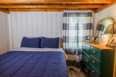 This one has a Northwoods personality with classic rustic charm - photo 19
