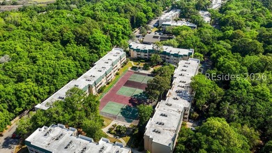 Experience the ultimate island lifestyle in this nicely updated - photo 20