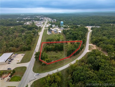 Nearly 2 acres of undeveloped land perfectly positioned on the - photo 2