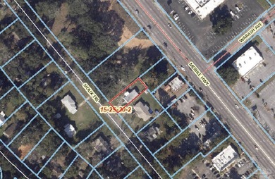 Property is a small plot of land on 0.16 acres. A double wide - photo 3