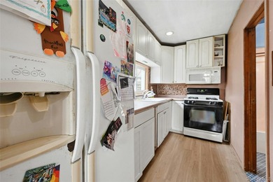 Opportunity awaits! Three bedroom, one bath Cape Cod-style home - photo 6