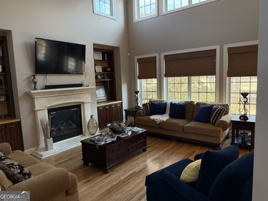 Beautifully positioned on the golf course, this four-sided brick - photo 18