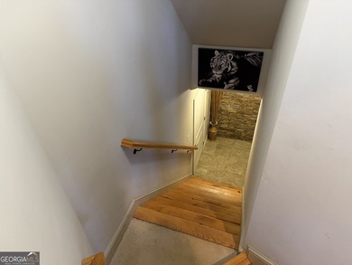 Beautifully positioned on the golf course, this four-sided brick - photo 41