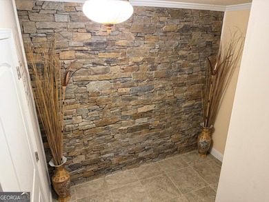 Beautifully positioned on the golf course, this four-sided brick - photo 42