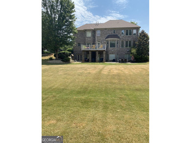 Beautifully positioned on the golf course, this four-sided brick - photo 50