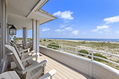 This spectacular 5 bedroom, 4 full bath, 2nd floor beachfront
