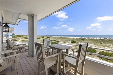 This spectacular 5 bedroom, 4 full bath, 2nd floor beachfront