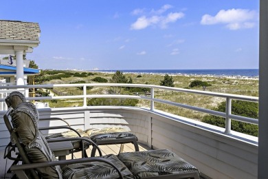 This spectacular 5 bedroom, 4 full bath, 2nd floor beachfront