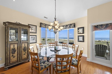 This spectacular 5 bedroom, 4 full bath, 2nd floor beachfront