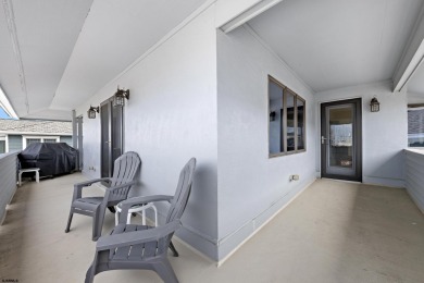 This spectacular 5 bedroom, 4 full bath, 2nd floor beachfront