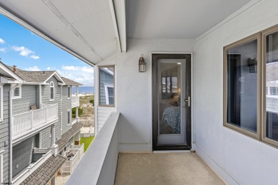 This spectacular 5 bedroom, 4 full bath, 2nd floor beachfront