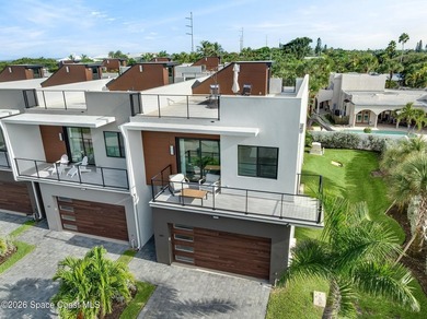 Built in 2024, this stunning end-unit townhome offers the - photo 1