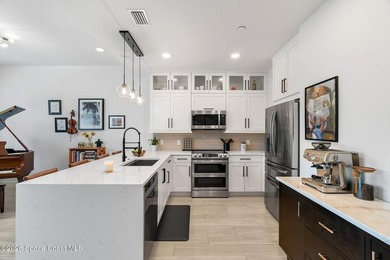 Built in 2024, this stunning end-unit townhome offers the - photo 4