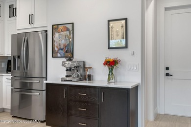 Built in 2024, this stunning end-unit townhome offers the - photo 6