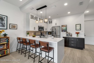 Built in 2024, this stunning end-unit townhome offers the - photo 7
