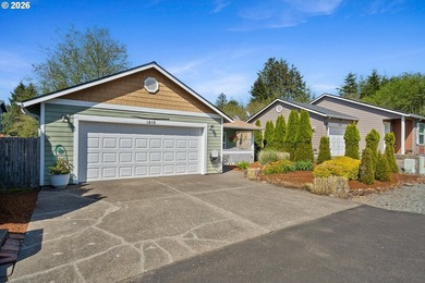 Rockaway Beach home on quiet street backs up to a pond to take - photo 30